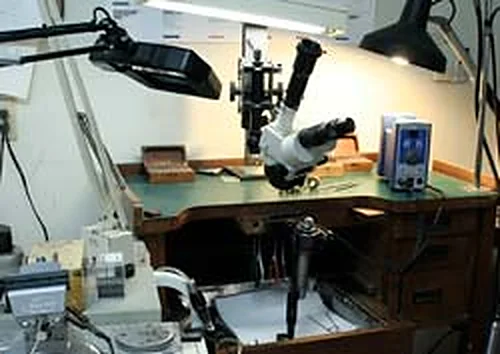 The jeweller's bench with microscope and lamps
