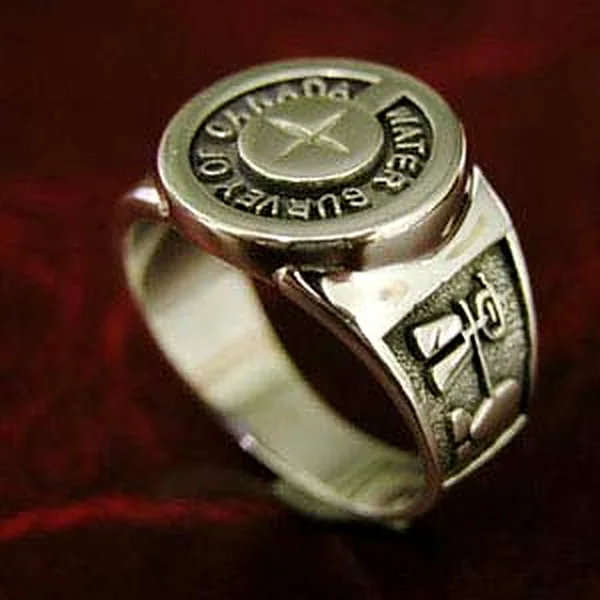 The Water Survey of Canada centennial signet ring in sterling silver, with the crest on its face